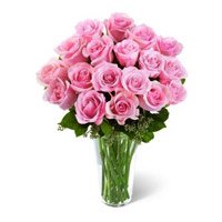 Place Order for Pink Roses in Vase of 24 Flowers to Bangalore and send to your loved ones on this New Year