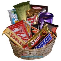 New Year Gifts in Bangalore associated with Basket of Assorted New Year Chocolates in Bengaluru