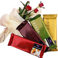 Deliver Diwali Gifts in Bengaluru consist of 4 Cadbury Temptation Chocolates With 3 Red Roses in Bangalore