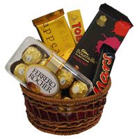 New Year Gifts Delivery to Bangalore consist of Ferrero Rocher, Bournville, Mars, Temptation, Toblerone Chocolate Basket