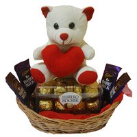 Online Gift of 4 Dairy Milk 16 Ferrero Rocher Chocolates and 6 Inch Teddy Basket Bangalore