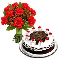 New Year Flowers to Bangalore. 12 Red Carnation Flowers to Bangalore with 1/2 Kg Black Forest Cakes in Bengaluru