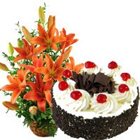 Online Flowers Delivery to Bengaluru. Send 12 Orange Lily Arrangement 1 Kg Black Forest Cake on Friendship Day