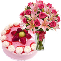 Send 4 Pink Lily 15 Rose Vase Flowers Bangalore and 1 Kg Strawberry Cake From 5 Star Hotel