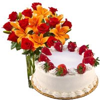 Same Day Gifts Delivery in Bangalore for 8 Orange Lily 12 Roses Vase 1 Kg Strawberry Cake 5 Star Bakery