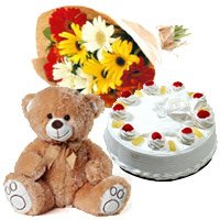 Deliver Online 12 Gerbera Bouquet, 1 Kg Pineapple Cake and 1 Teddy Bear to Bangalore