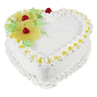 Deliver Online 1 Kg Eggless Heart Shape Pineapple Cake to Bangalore