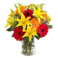 Order New Year Flowers to Bangalore. Lily Gerbera Bouquet in Vase 12 Flowers in Bangalore