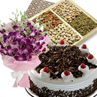 Deliver 1/2 Kg Black Forest Cake and 5 Purple Orchids Bunch with 500 gm Mix Dry Fruits Online Bangalore. Christmas Gifts to Bangalore.