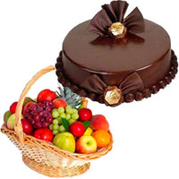 New Year Gifts to Bengaluru be add up to 1 Kg Fresh Fruits to Bengaluru in Basket with 500 gm Chocolate Truffle Cakes Bengaluru