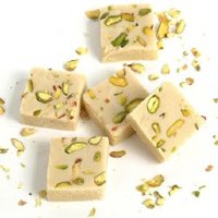 Online New Year Gifts Delivery to Bangalore consist of 500gm Mawa Barfi Sweets in Bengaluru