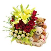 Best Diwali Gift Delivery in Bangalore that contains 2 Lily 12 Roses with 16 Ferrero Rocher and Twin Small Teddy Basket