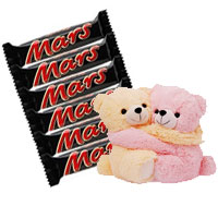 Online Cakes to Bangalore that includes 6 Mars Chocolates with Hugging Teddy to Bengaluru