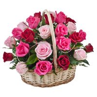 Rakhi Flower Delivery of Red Pink Peach Roses Basket 24 Flowers to Bangalore