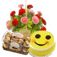 Online Rakhi Delivery of 15 Red Pink Carnation Basket with 16 pcs Ferrero Rocher and 1 Kg Smiley Cakes in Bangalore