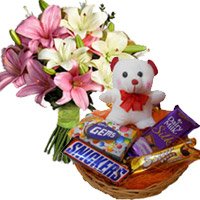 6 Pink White Lily, 6 Inches Teddy with Basket of Chocolates to Bangalore Online. New Year Gifts to Bengaluru