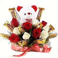 Place order for 36 Red White Roses and 16 Pcs Ferrero Rocher Bouquet in Bangalore. Best Diwali Gifts to Bangalore.