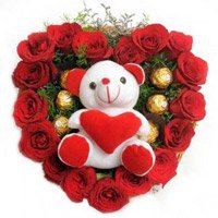 Send 18 Red Roses and 5 Ferrero Rocher with Teddy Heart. Online New Year Gifts to Delivery at Midnight