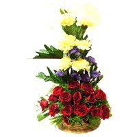 Online Rakhi and Flowers to Bangalore. Red Rose Yellow Carnation Basket