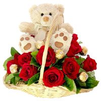 Online Gifts Delivery to Bangalore contain 12 Red Roses, 10 Ferrero Rocher and 9 Inch Teddy Basket on Diwali