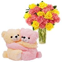 Buy Online 24 Pink Carnation Yellow Rose Vase With Hugging Teddy Bear also send Diwali Gifts in Mysore