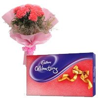 Send Cadbury Celebration Pack with 6 Pink Carnation Flowers. Send New Year Gifts to Bangalore