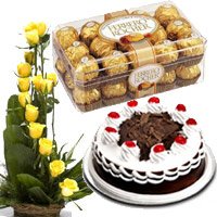 Submit Online Order for New Year Gifts in Bangalore consist of 15 Yellow Rose Basket 1/2 Kg Black Forest Cake 16 Pcs Ferrero Rocher Chocolate in Bangalore
