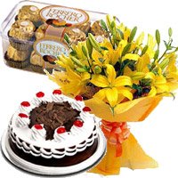 Send Diwali Chocolates to Bangalore. 12 Yellow Lily with 1/2 Kg Black Forest Cakes in Bangalore and 16 Pcs Ferrero Rocher