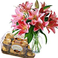 Diwali Gifts Delivery in Bangalore incorporate with 15 Pink Lily in Vase and 16 Pcs Ferrero Rocher Chocolates in Bangalore