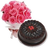 Send New Year Cakes to Bangalore that includes 1 Kg Eggless Chocolate Cake and 12 Pink Roses in Bengaluru