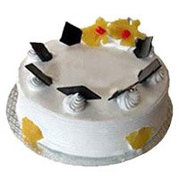 Send Diwali Cakes to Bangalore comprising of 1 Kg Eggless Pineapple Cake From 5 Star Bakery
