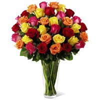 Buy Online New Year Flowers to Bangalore comprising Mixed Roses in Vase of 50 Flowers to Bangalore