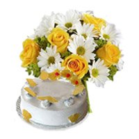 Place Order for New Year Gifts in Bangalore to Deliver White Gerbera with Yellow Roses of 18 Flowers and 1 Kg Pineapple Cake to Bangalore