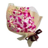 Send Pink Orchid Bunch 12 Flowers in Bengaluru Stem on Friendship Day Online