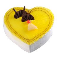 Order Cake Online Bangalore Midnight Delivery that includes 3 Kg Heart Shape Pineapple Cake