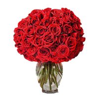 Send Red Roses in Vase of 100 New Year Flowers to Bengaluru along with New Year Flowers in Bengaluru