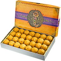 Deliver Online New Year Gifts to Bangalore also send 500gm Besan Laddu Sweets in Bengaluru