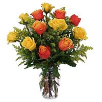 Deliver attractive Diwali flowers of Yellow Orange Roses Vase of 12 Flowers in Bangalore